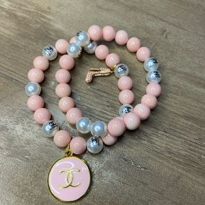 Baby pink and charm bracelet